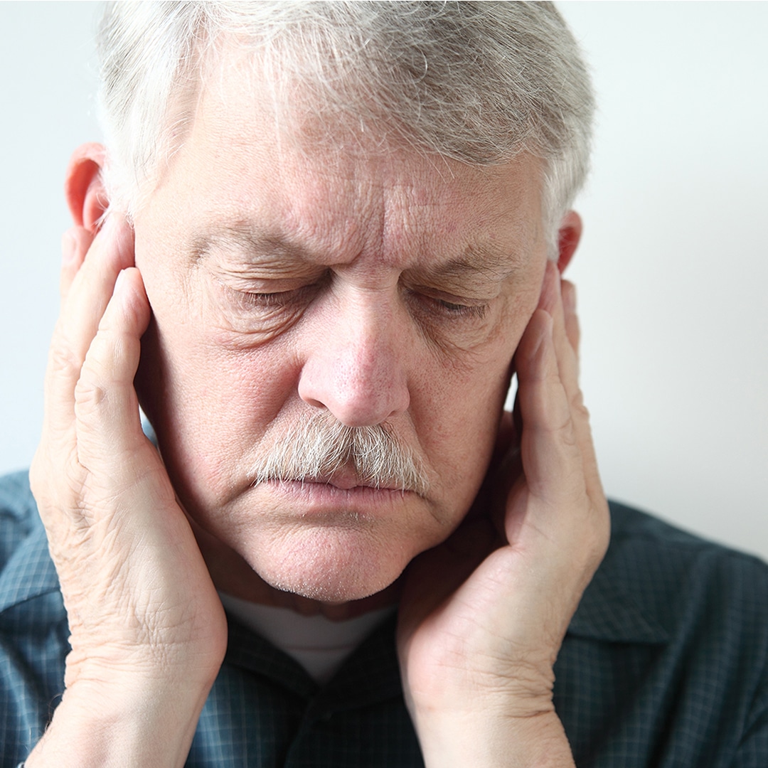 older man with an earache