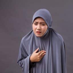 person with chest pain/heart burn