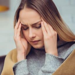 person with nosebleed