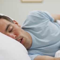 Man sleeping with his mouth open